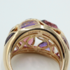 18 kt gouden ring gemerkt en genummerd Fabergé 74/300. De ring is gezet met Tourmalijnen, Quartz en Amethisten. 13 gram