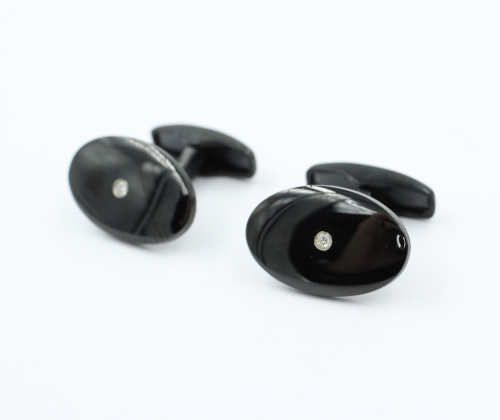 Ovale manchetknopen met briljant en zwarte keramische coating