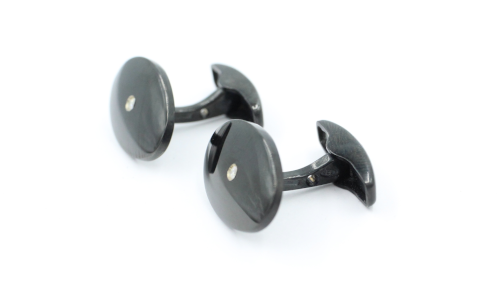 Ovale manchetknopen met briljant en zwarte keramische coating